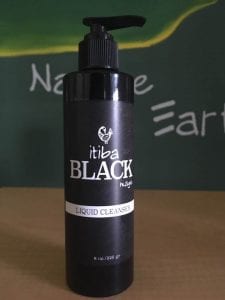 Bottle of itiba Black magic liquid cleanser for men's skincare